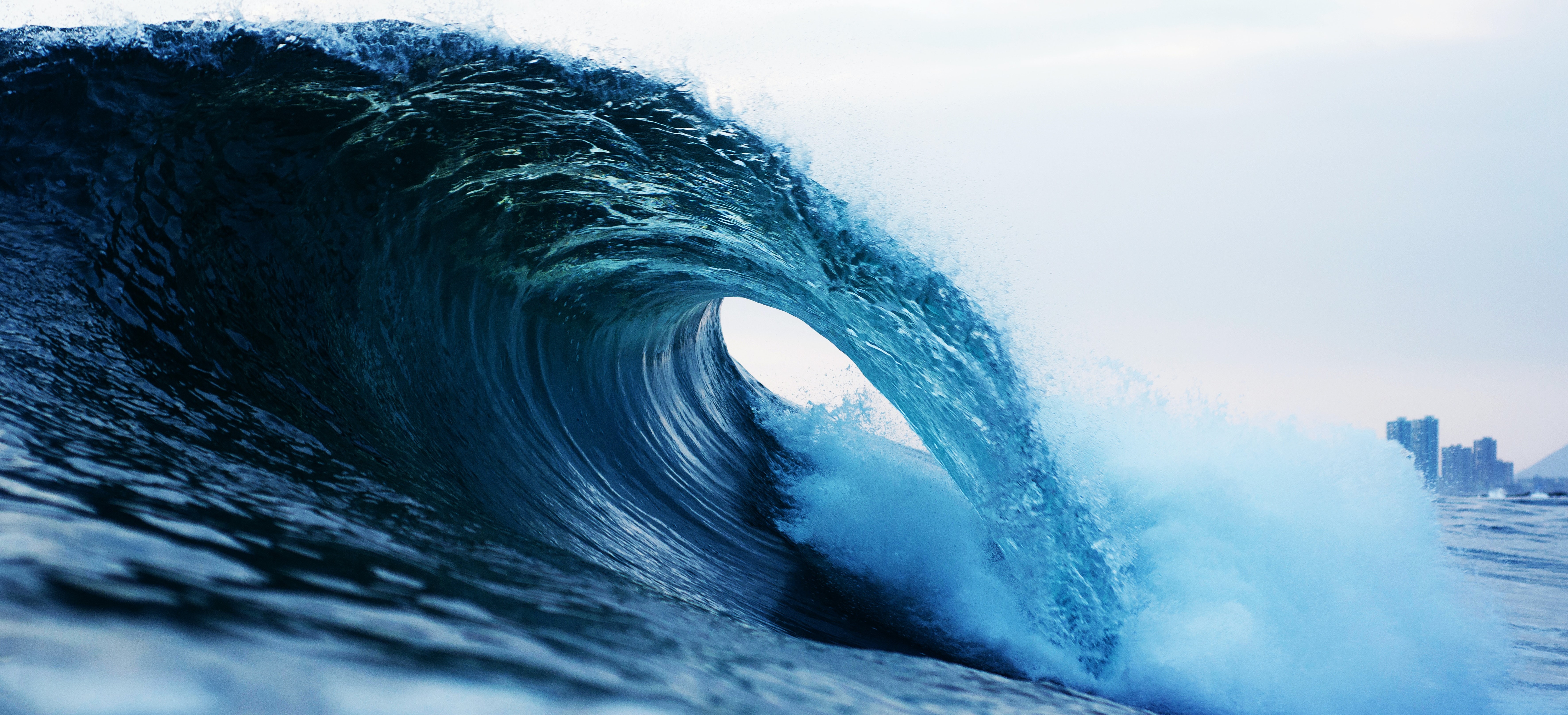 A rolling wave in bright blue