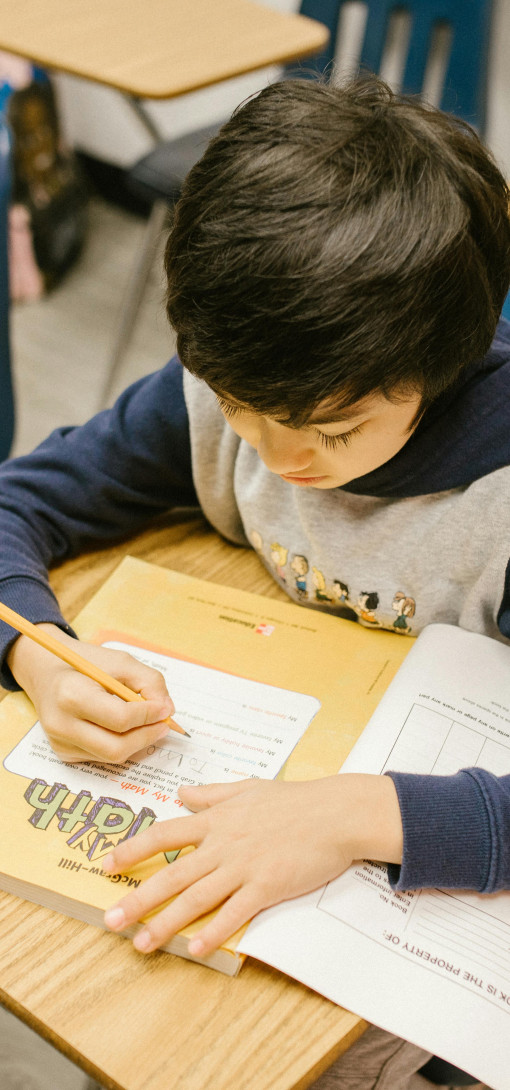 Children in a classroom writing