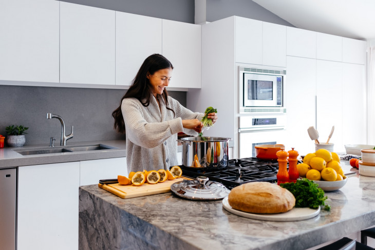 Woman cooking in kitchen